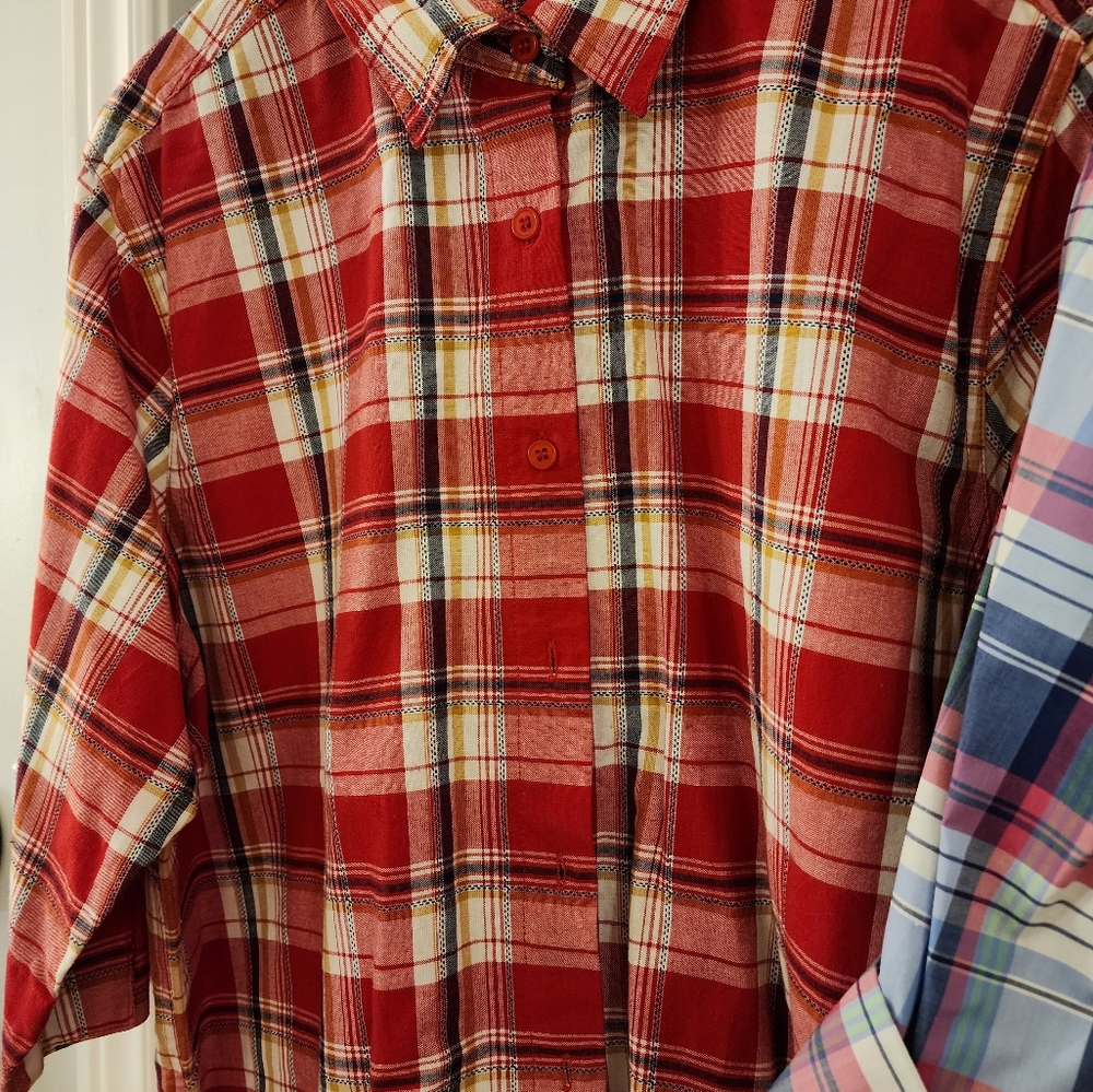 Plaid ladies blouse with 3/4 sleeve and box cut bottom hem
